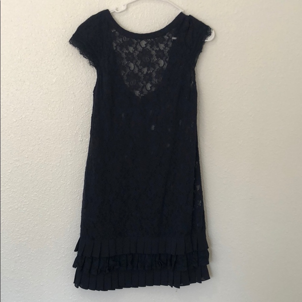 Lace dress with subtle frills at the bottom